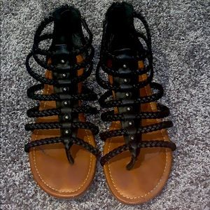 Brown and black sandals